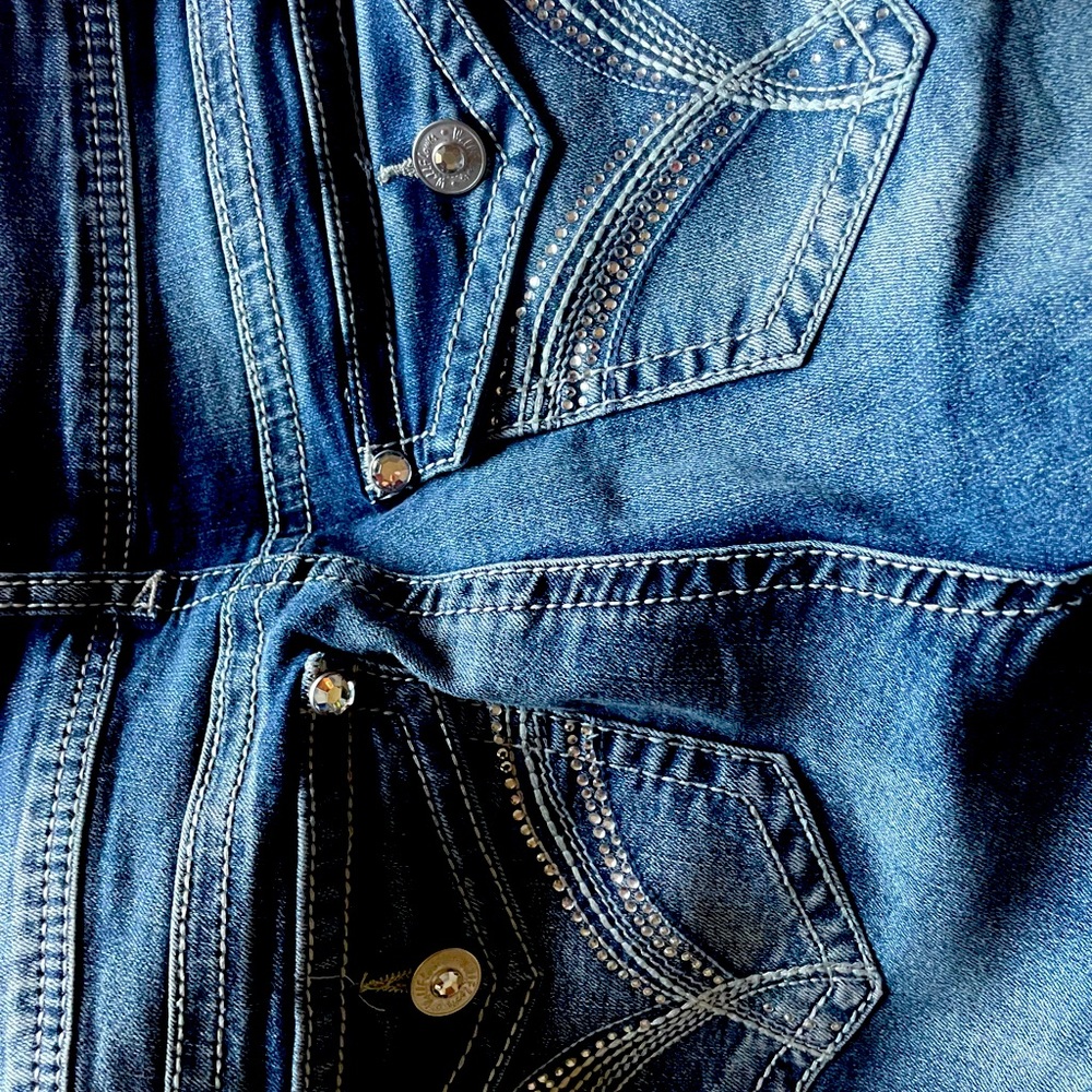 Bootcut embellished pockets never worn.